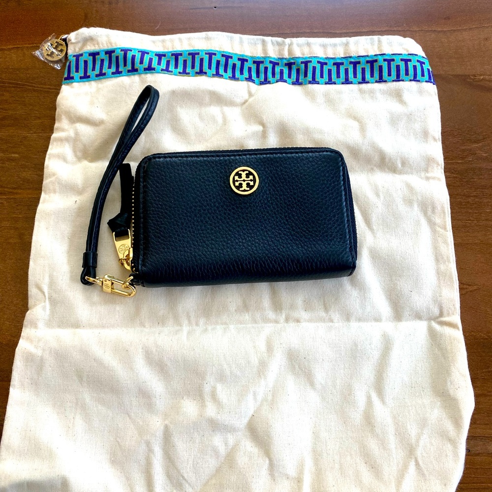 Brand new, never used black Tory Burch wristlet wallet with gold hardware.